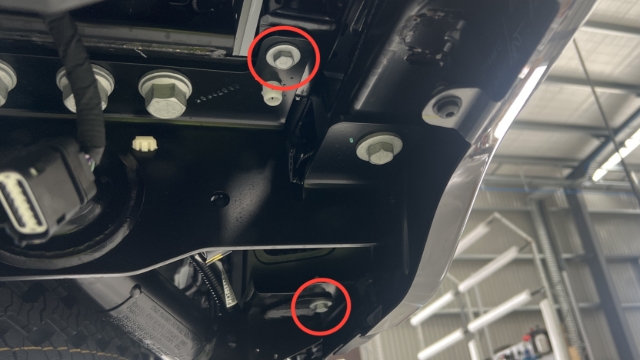 <p>Remove the 2 13mm bumper bolts from 1 side of the bumper.</p>