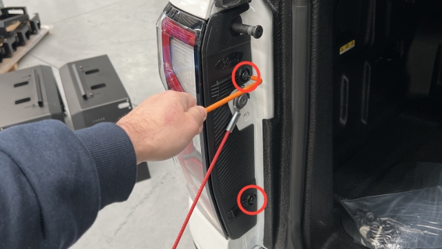 <p>Remove 1 taillight using a T30 torx screwdriver.</p>