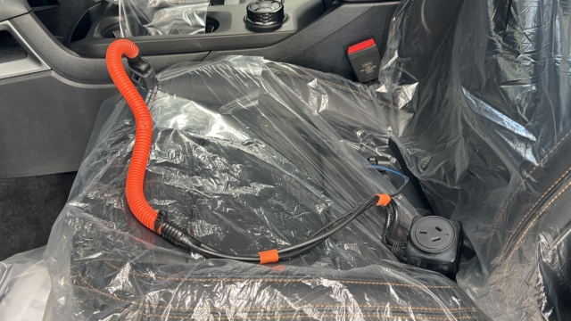 <p>Place the 230V plug in the cab.</p>