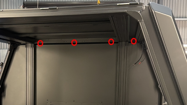 <p>Cable tie the driver's side door branch to the top-front of the body.</p>