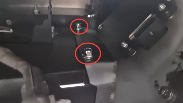 <p>Remove the 2 x M6 nyloc nuts securing the rear radar housing.</p>