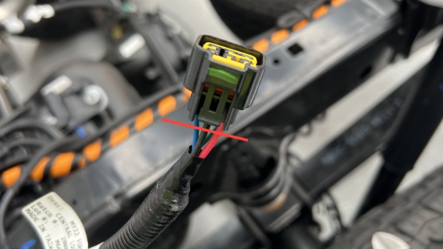 <p>Cut this plug off the wiring harness (located near the fuel filler).</p>