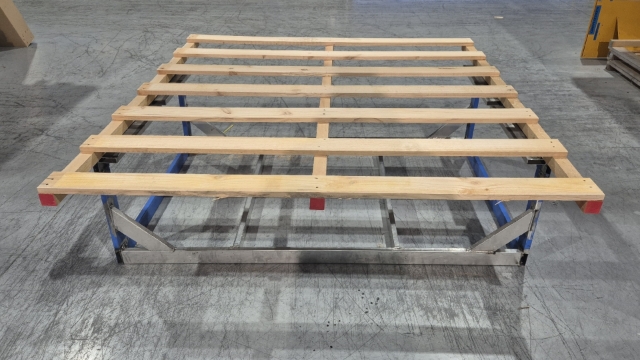 <p>Place pallet onto the dispatch frame.</p>