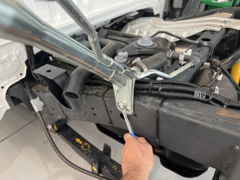<p>Unbolt the factory fuel neck from the vehicle chassis with a 12mm spanner/socket.</p>