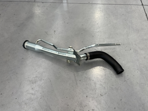 <p>Remove the factory fuel filler.</p>
