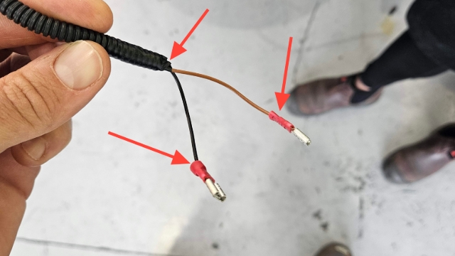 <p>Crimp 2 x Female Spade connectors onto each core, tape tubing secure with insulation tape </p>