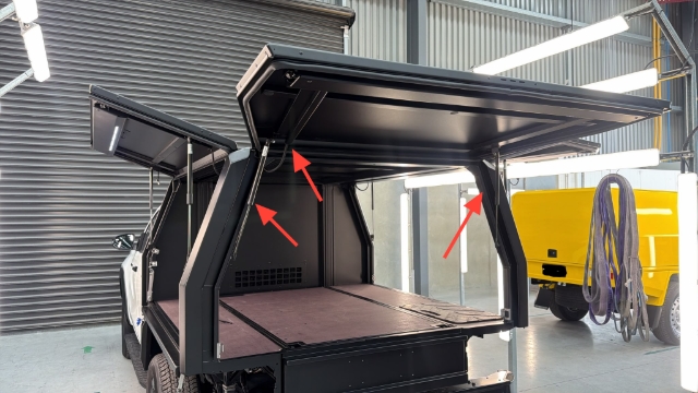 <p>Before removing the door, unplug and plugs and disconnect the gas struts.</p>