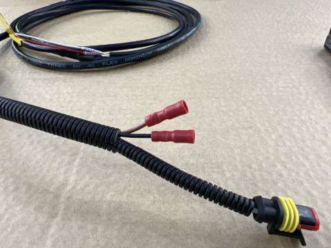 <p>Install female bullet terminals to each wire. Firmly compress the connector to ensure a secure connection.</p>