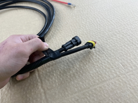<p>Remove the insulation tape near the super seal connectors.</p>