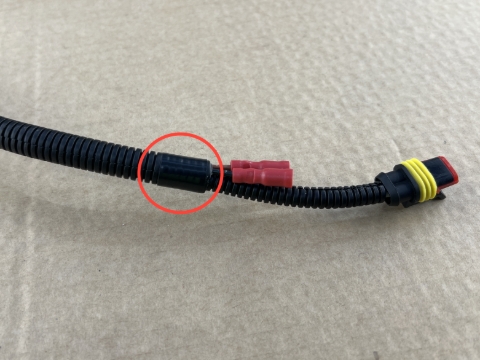 <p>Wrap the corrugated sleeve in insulation tape to ensure the wires stay protected.</p>