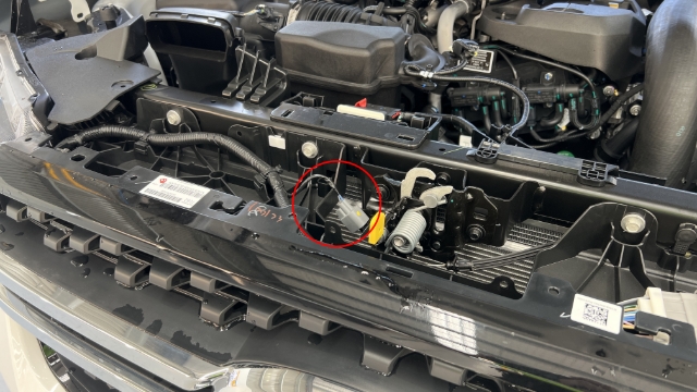 <p>Identify the hood courtesy plug.</p>