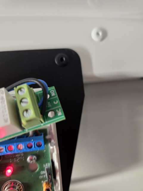 <p>Extend the lines to reach the relay inside the PIR Sensor, first wire will be connected on C (Common Terminal) and the other into NC (Normally Closed Terminal). </p><p>Note: Interchangeable </p>