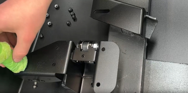 <p>Prepare all of the powder coated surfaces using a surface activator.</p><blockquote><p>Take care not to get surface activator on visible areas of the canopy as this alters the surface of the powder coating to help the glue to stick.</p></blockquote><p></p>