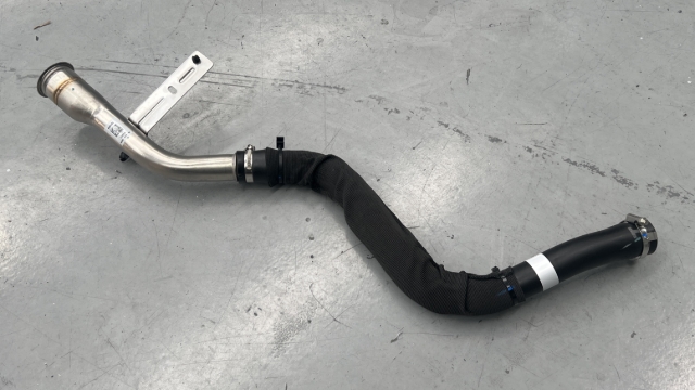 <p>Remove and dispose of the factory fuel filler pipe.</p>