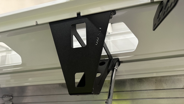 <p>Tighten (but don't torque) all chassis mounts to the body/tray using an impact driver.</p>