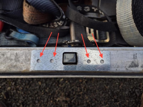 <p>Place the brace PRT-012896 over the latch pin.</p><p></p><p>Mark and drill 4 x holes with a 6.5mm drill bit.</p>