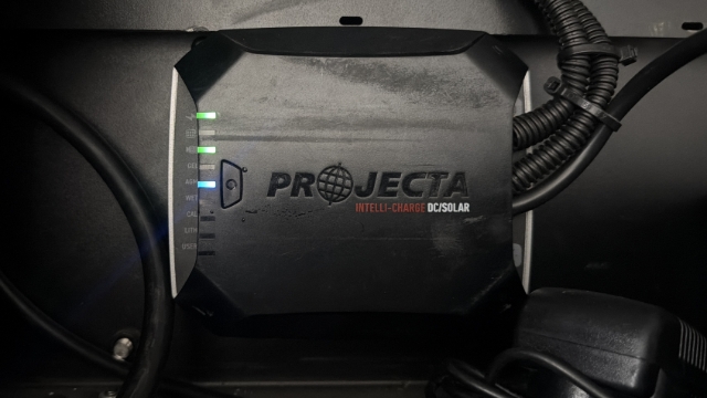 <p>Start the vehicle to check the charging functionality.</p><ul><li><p>The top green light should flash green to indicate charging function.</p></li><li><p>The green light below should stay solid green to indicate charging from the alternator.</p></li><li><p>The blue light should be set to the auxiliary battery type (AGM)</p></li></ul><p></p>