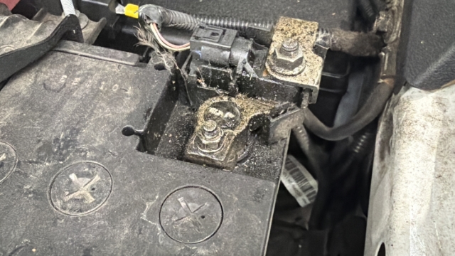 <p>Reconnect the negative terminal to the battery using a 10mm spanner.</p>