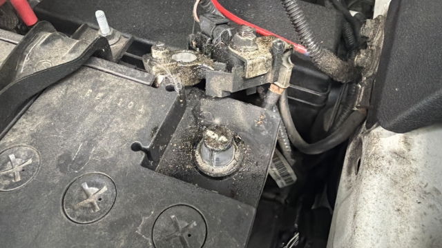 <p>Isolate the starter battery by disconnecting the negative terminal with a 10mm spanner.</p>
