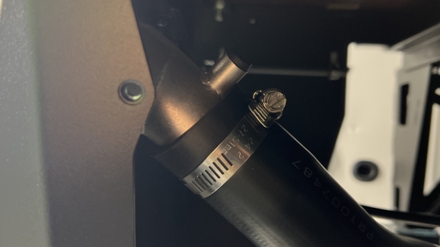 <p>Secure the moulded fuel hose to the fuel neck using an 8mm hose clamp.</p><blockquote><p><strong>CQC: Pull/twist test the hose to ensure this is tight.</strong></p></blockquote><p></p>