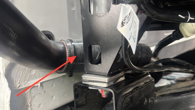 <p>Protect the main fuel line from rubbing against the chassis using an external sheath.</p>