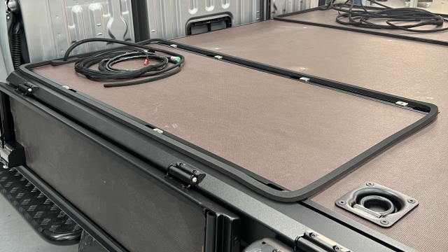 <p>Using the groove in the ply as a guide, run the D-Seal around where the canopy or toolbox will go. </p>