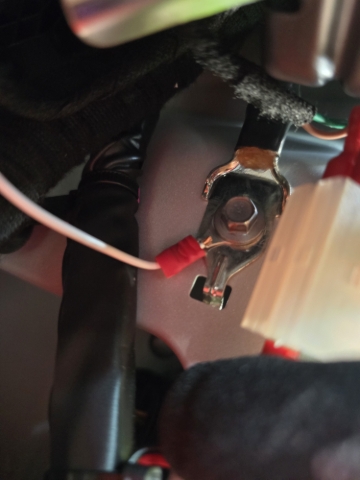 <p>For the earth, install an eye terminal on the white wire and install it to the ground terminal on the side.</p>