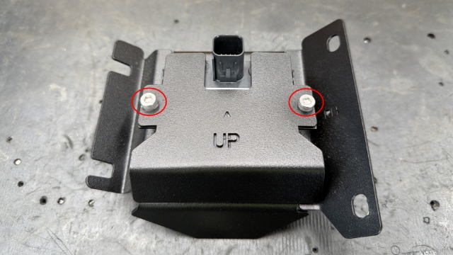 <p>Fix the backing plate to the sensor bracket using 2 loctited M5x12 capscrews.</p>