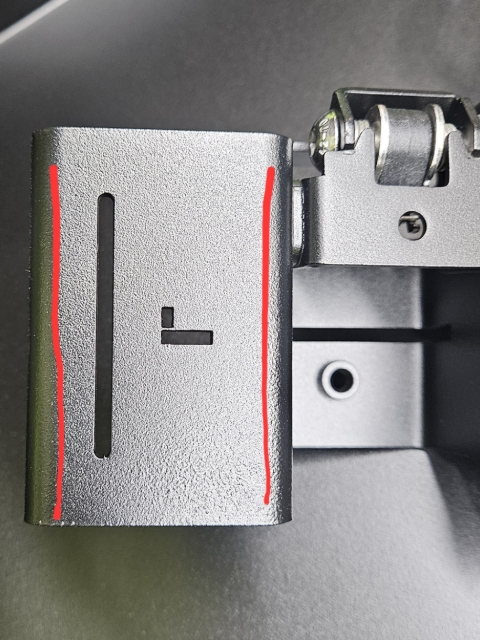 <p>Red lines show where to apply sealant. Avoid applying between lines as this will bend the centre of the branding plate.</p>