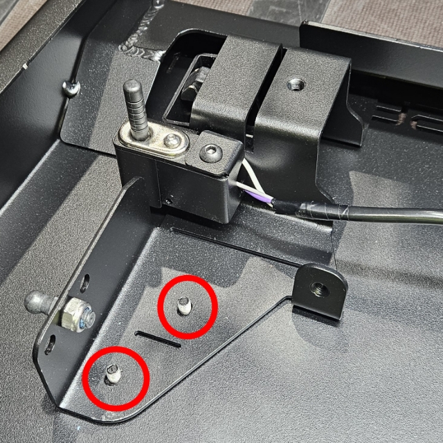 <p>Place branding plate in and place bracket on top </p><p>Re-tighten nuts until snug as per other brackets </p>