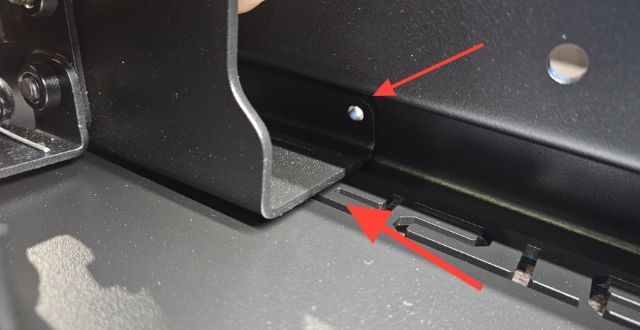 <p>Verify fitment of bracket. Inspect rivet holes in bottom flange. The alignment provides ~2mm of gap between the inside door face and the back of the bracket.</p>