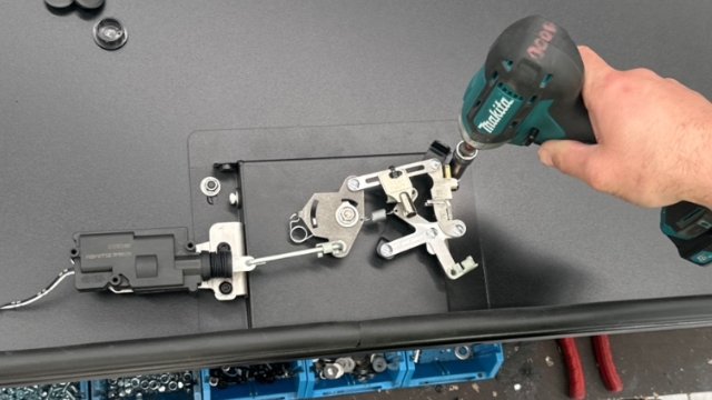 <p>Place the handle onto the door and secure onto the studs also ensuring that the M5 bolts in the bottom of the handle line up also.</p><p><br></p><p>NOTE: Do not overtighten the M6 nyloc nuts, these are to help hold the handle in place while the glue dries.</p>