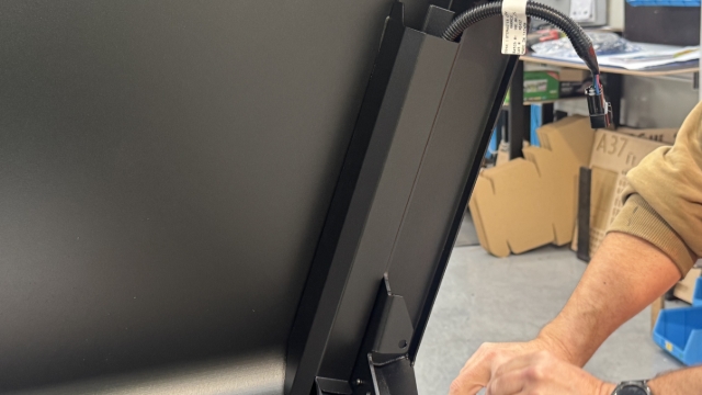 <p>This is how it looks when attached, ensure the loom is not jammed behind cover.</p>