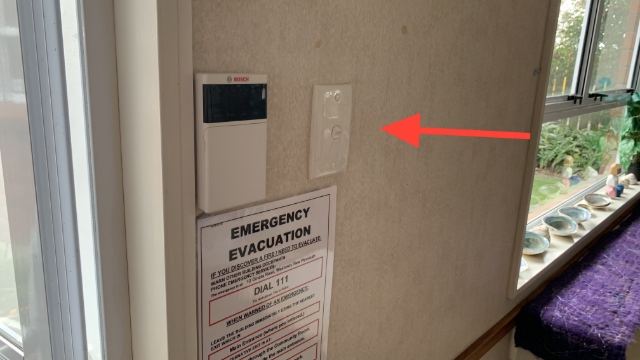 <p>The light switch is located to the left of the door</p>