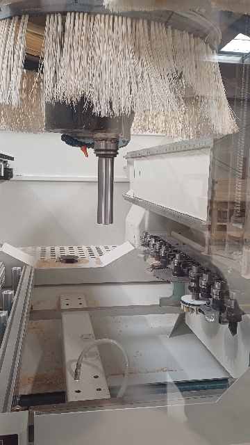 <p>Load the clocking bar into the spindle, by instructing it to load the original tool number. </p><p>The clocking bar does not have it's own tool number, which is why we do this step.</p>