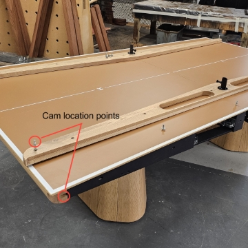 <p>With cam bolts fitted, place Ash side rails onto table carcass </p>