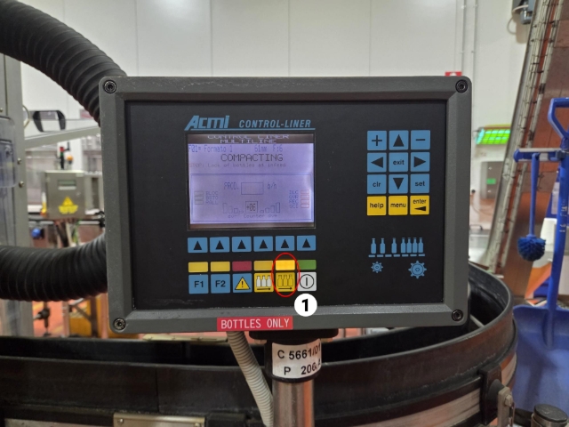 <p>At the singuliser before the blower which controls from the filler to the labeller (Controller 3)</p><p></p><p>1.Press <em>'compacting'</em> button</p><p></p><blockquote style="background-color: var(--k-quote-bg-error);"><p>When bringing in bottles to the labeller make sure that we watch for fallen bottles otherwise this may cause a bottle crash</p></blockquote><p></p>