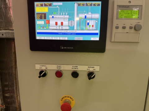 <p>Check the boiler HMI for active faults</p><p>Investigate fault reason -</p><p><strong>Low water</strong> - check water pumps and water supply. </p><p><strong>Low fuel pressure</strong> - check incoming fuel pressure</p><ul><li><p>Reset Fault</p></li></ul><p><strong>Boiler restarts</strong></p><p>If below 3bar low flame hold will be activated. You may need to close main steam outlet at back of boiler to allow pressure to build rapidly. Once high flame enables <strong>SLOWLY</strong> reopen the steam outlet. Take to full open then close by 1/2 turn</p>