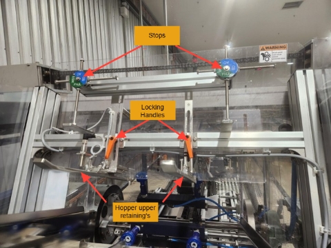 <h2>Step 2 - Hopper Height</h2><ol><li><p>Loosen the two locking handles</p></li><li><p>Move slightly the hopper upper retaining to the correct format</p></li><li><p>Bring the hopper upper retaining's against the stop</p></li><li><p>Tighten the two locking handles</p></li></ol><p></p>