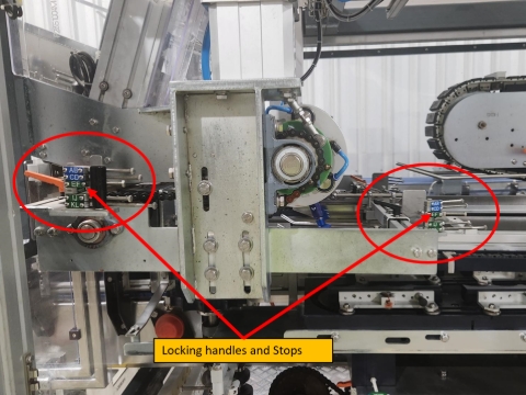 <h2>Step 7 - Paper feed chains</h2><ol><li><p>Unscrew the two locking handles so they are fully loose</p></li><li><p>Push the paper feed chains slightly and set the stop to the format required</p></li><li><p>Pull the feed chains against the stops</p></li><li><p>Tighten the locking handles</p></li><li><p>Repeat steps for other side</p></li></ol><p></p>