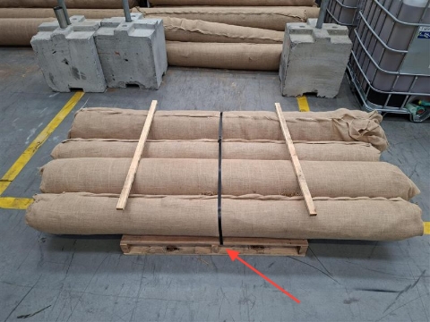 <p>Lay your first layer of rolls down and put a strap down the middle as close as you can to the centre board.</p><p>(If you are only doing a single layer, this is your final layer and you should strap the same as Step 4)</p>