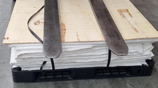 <p>Use hoist or similar weight to evenly compress the stack.</p>