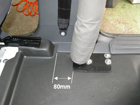 <ul><li>Position Base Plates as shown (both sides of vehicle).</li><li>Pilot drill holes through floor, then enlarge to Ø10mm.</li><li>Remove all drill swarf from vehicle, then fit M10 x 50 But. Set Screw and Flat Washers through holes.</li></ul>