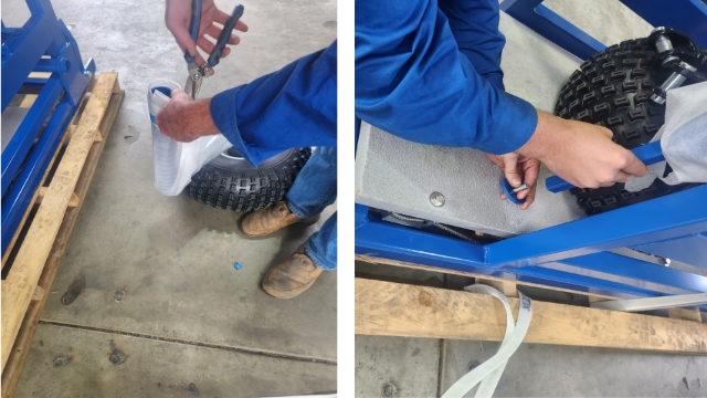 <p>Remove the bolt and washer from the bottom of the axle bar, you should then be able to slide the axle bar out of the wheel axle.<br></p>