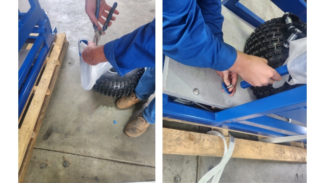 <p>Remove the bolt and washer from the bottom of the axle bar, you should then be able to slide the axle bar out of the wheel axle.<br></p>