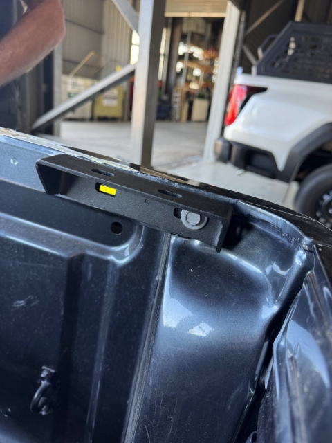 <p>Using a 4mm drill bit - Drill a pilot hole where marked. </p>
