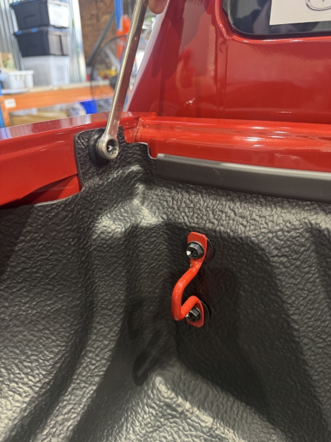 <p>Using the 12mm Spanner, remove the two bolts retaining the tub rack at the Front.</p><p>Keep for later use.</p>