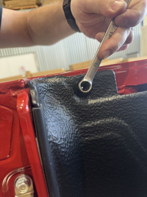 <p>Using the 12mm Spanner, remove the two bolts retaining the tub rack at the rear.</p><p>Keep for later use.</p>