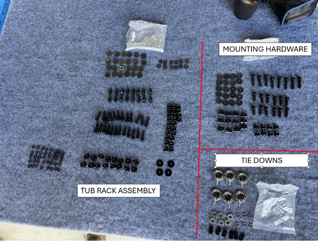 <p>You will be provided with 3x bags of fasteners:</p><ul><li><p>1x Tub Rack Assembly</p></li><li><p>Mounting Hardware</p></li><li><p>Tie Downs</p></li></ul><p>Please note: The mounting hardware will vary from this image based on the vehicle specific kit.</p><p></p>