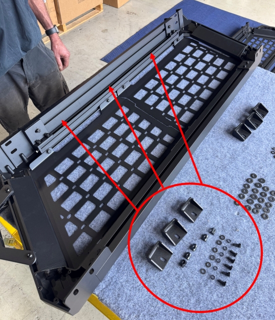<p>Fit three right angle brackets to the top extrusion channels. (LHS pictured)</p><p>You will need:</p><ul><li><p>6x spring T-nuts</p></li><li><p>6x 16mm Hex Head Bolts</p></li><li><p>6x Spring Washers</p></li><li><p>6x Flat Washers</p></li></ul><p></p>